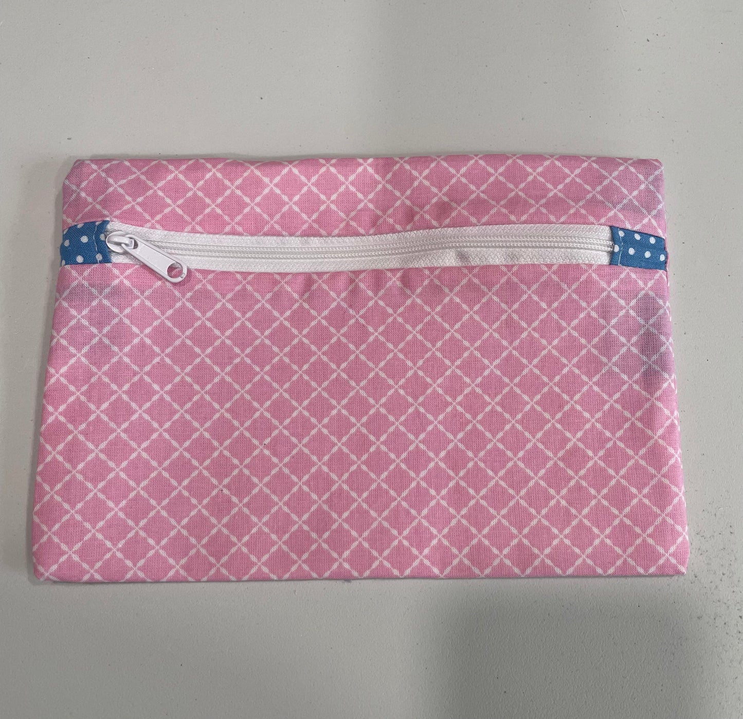 Small zippered fabric pouches