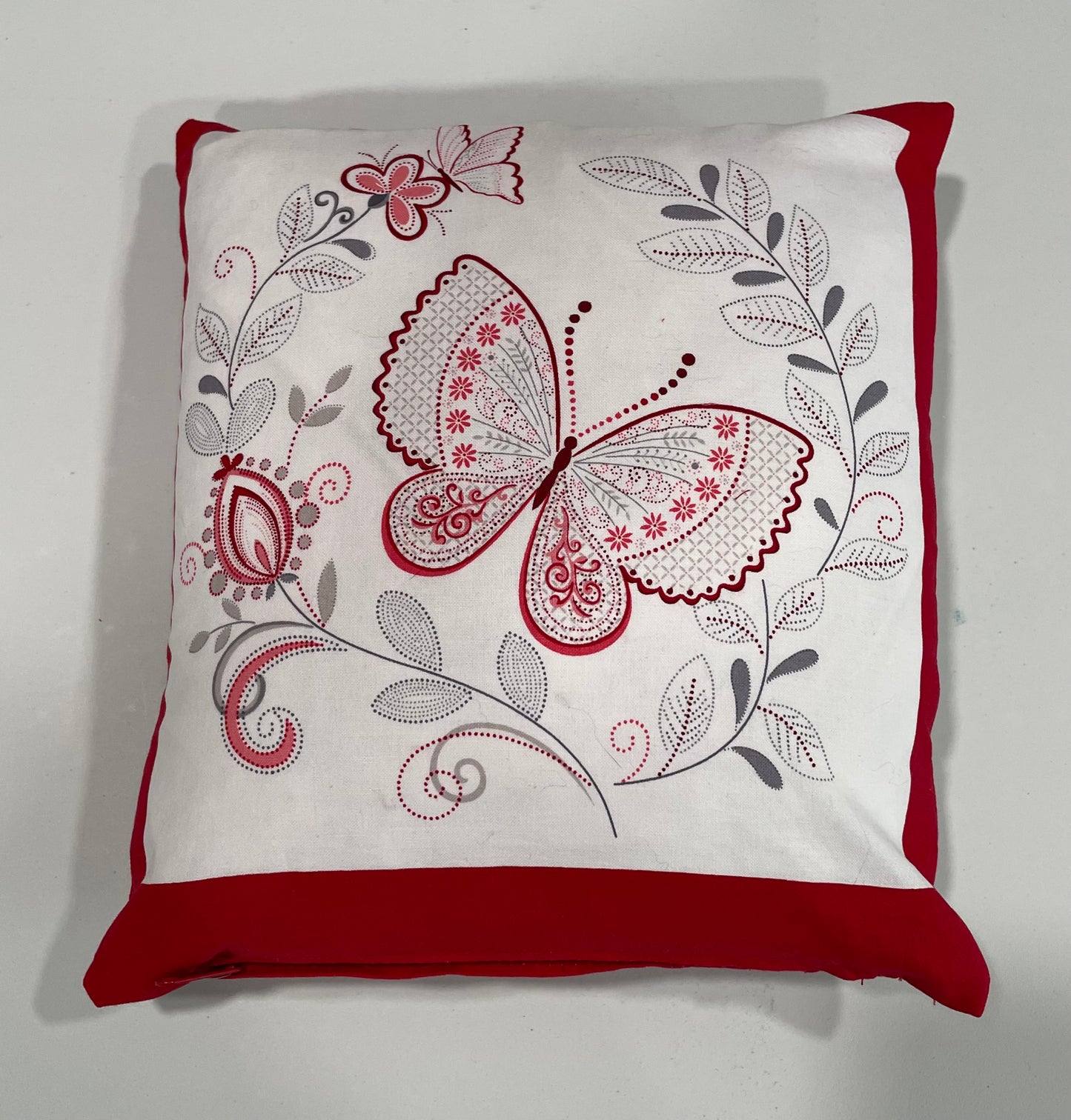 Red and white decorative pillow