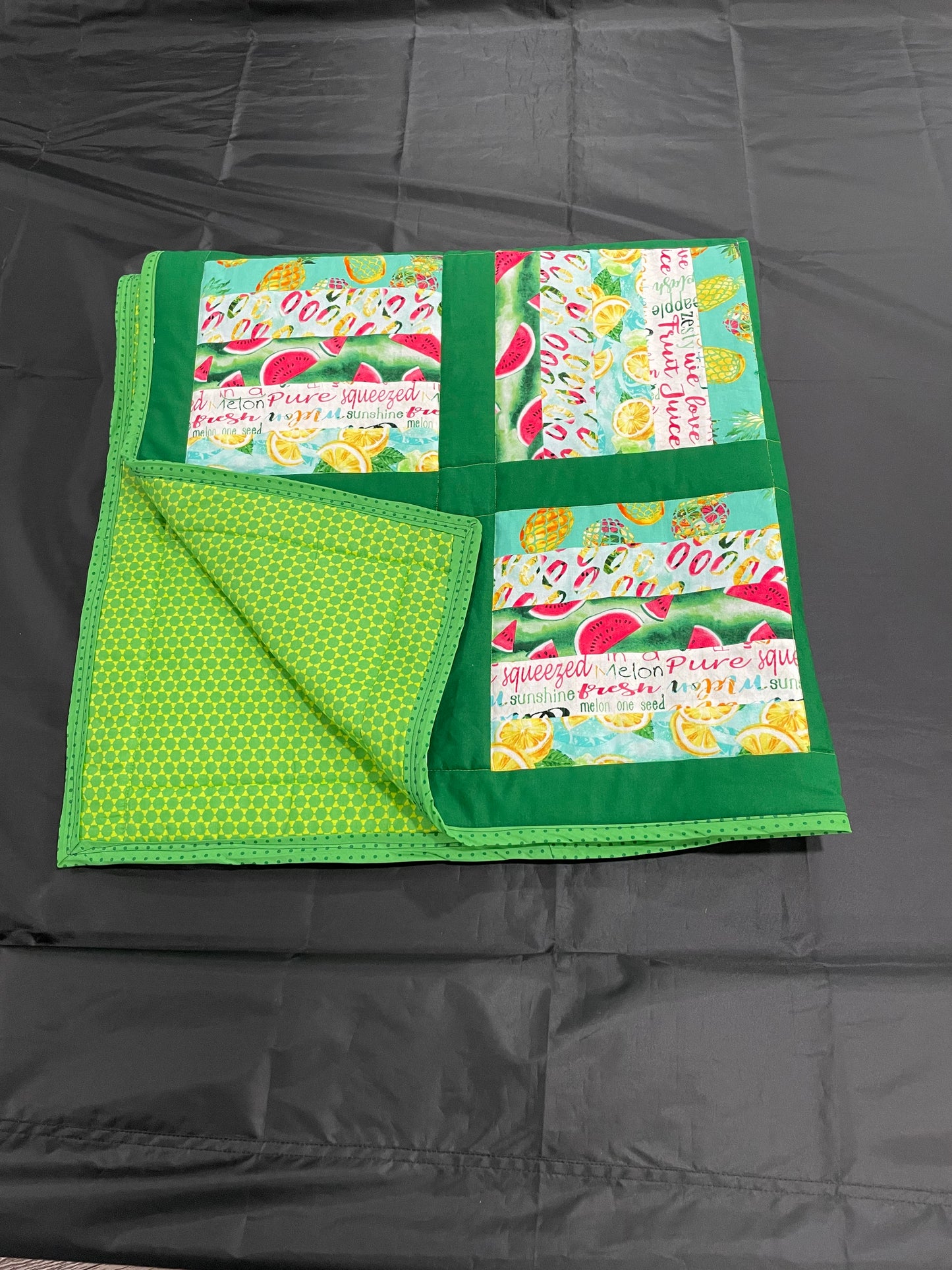Handcrafted picnic size quilt