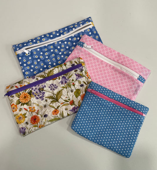 Small zippered fabric pouches