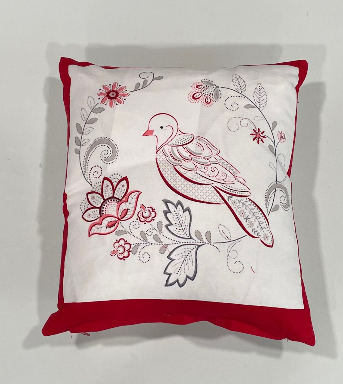 Red and white decorative pillow