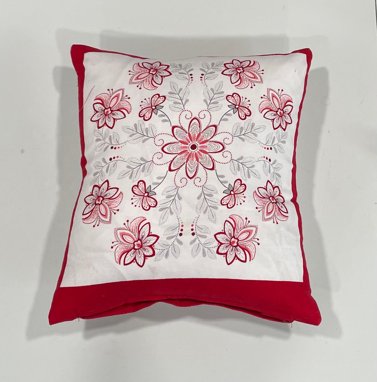 Red and white decorative pillow